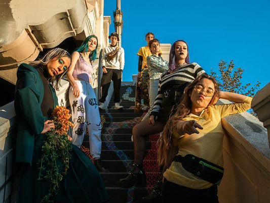 FTM group sitting on the stairs