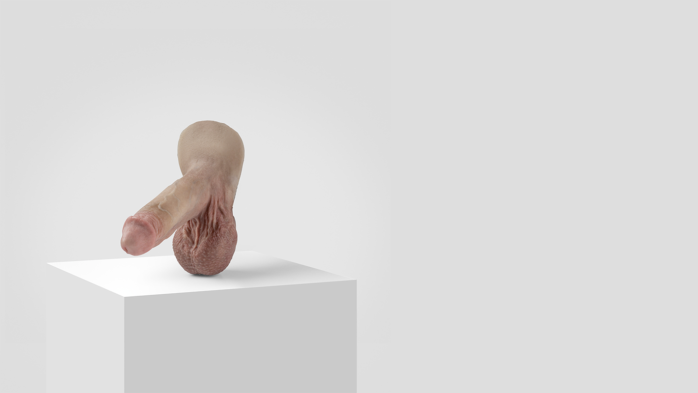 Ultra-realistic FTM silicone prosthetic displayed on a minimal white stand – Emisil handmade penis prosthesis for transgender men.