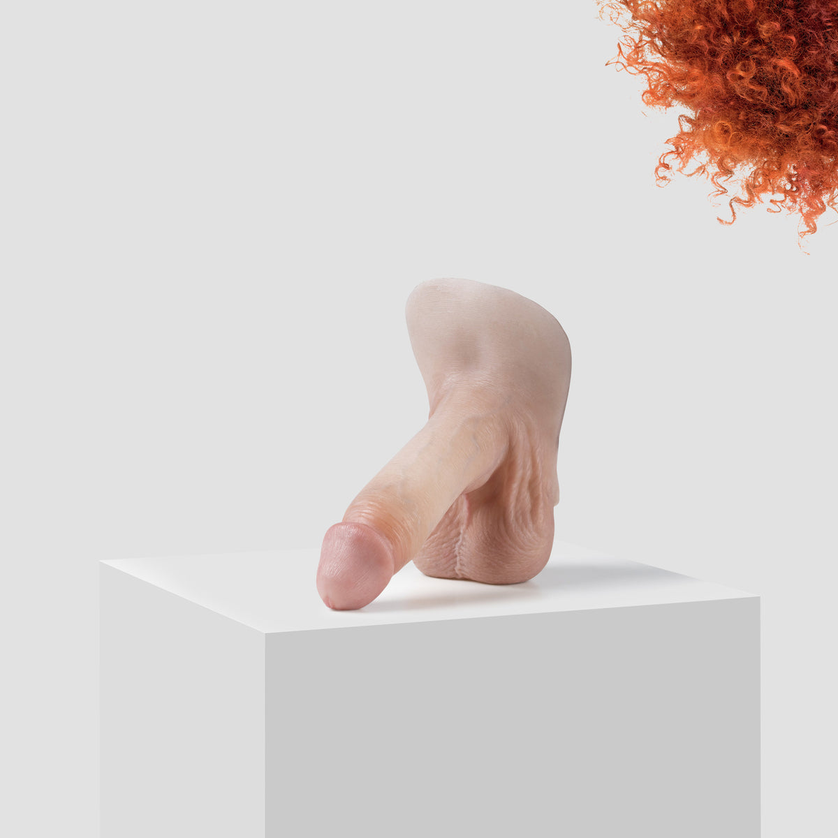 Emisil ER09 FTM pack and play prosthetic in skin shade S02 with ginger hair