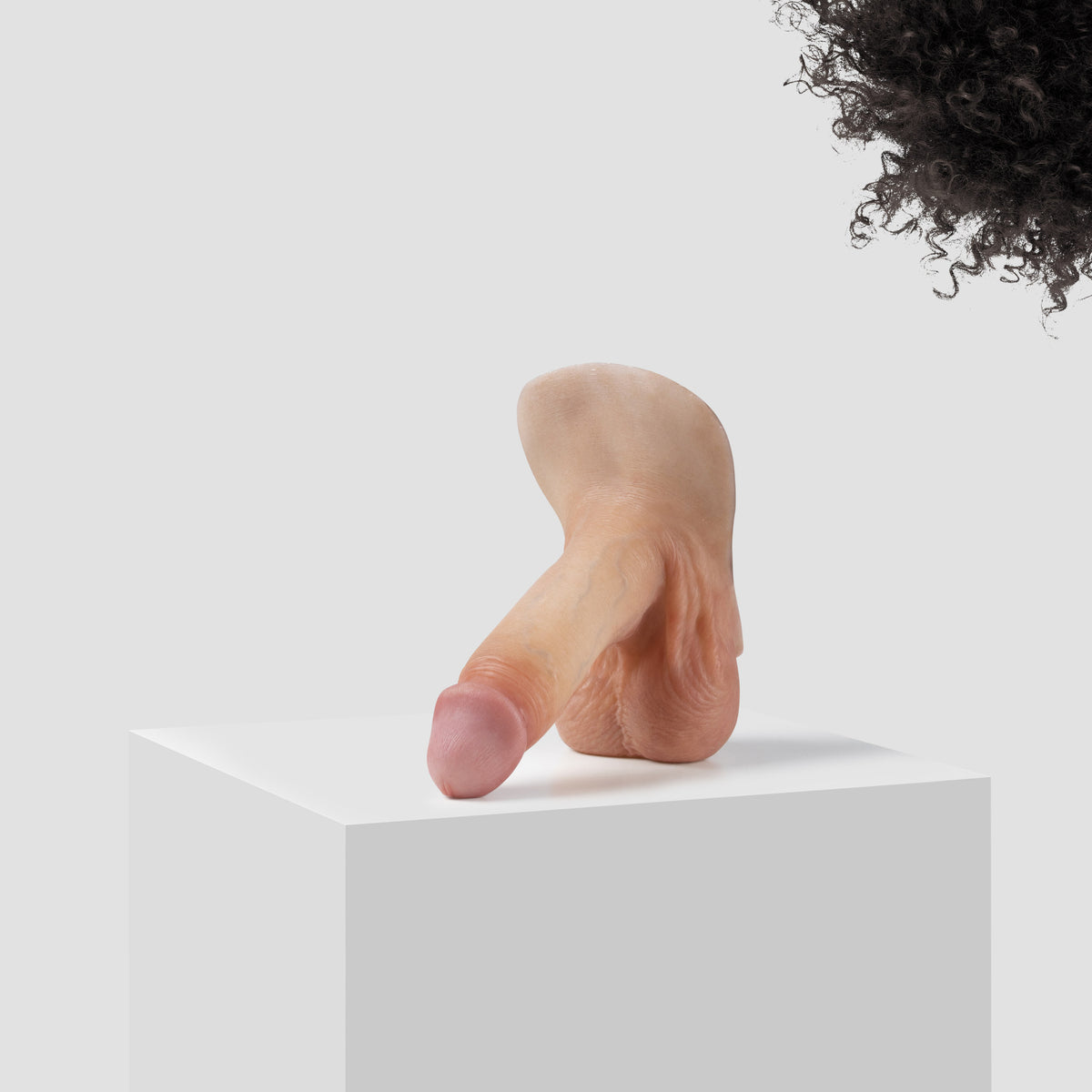 Emisil ER09 FTM pack and play prosthetic in skin shade S03 with black hair