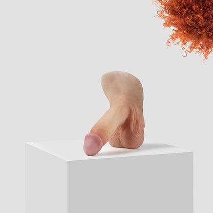 Emisil ER09 FTM pack and play prosthetic in skin shade S03 with ginger hair