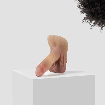 Emisil ER09 FTM pack and play prosthetic in skin shade S04 with black hair