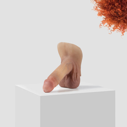 Emisil ER09 FTM pack and play prosthetic in skin shade S04 with ginger hair