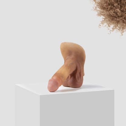 Emisil ER09 FTM pack and play prosthetic in skin shade S05 with blond hair
