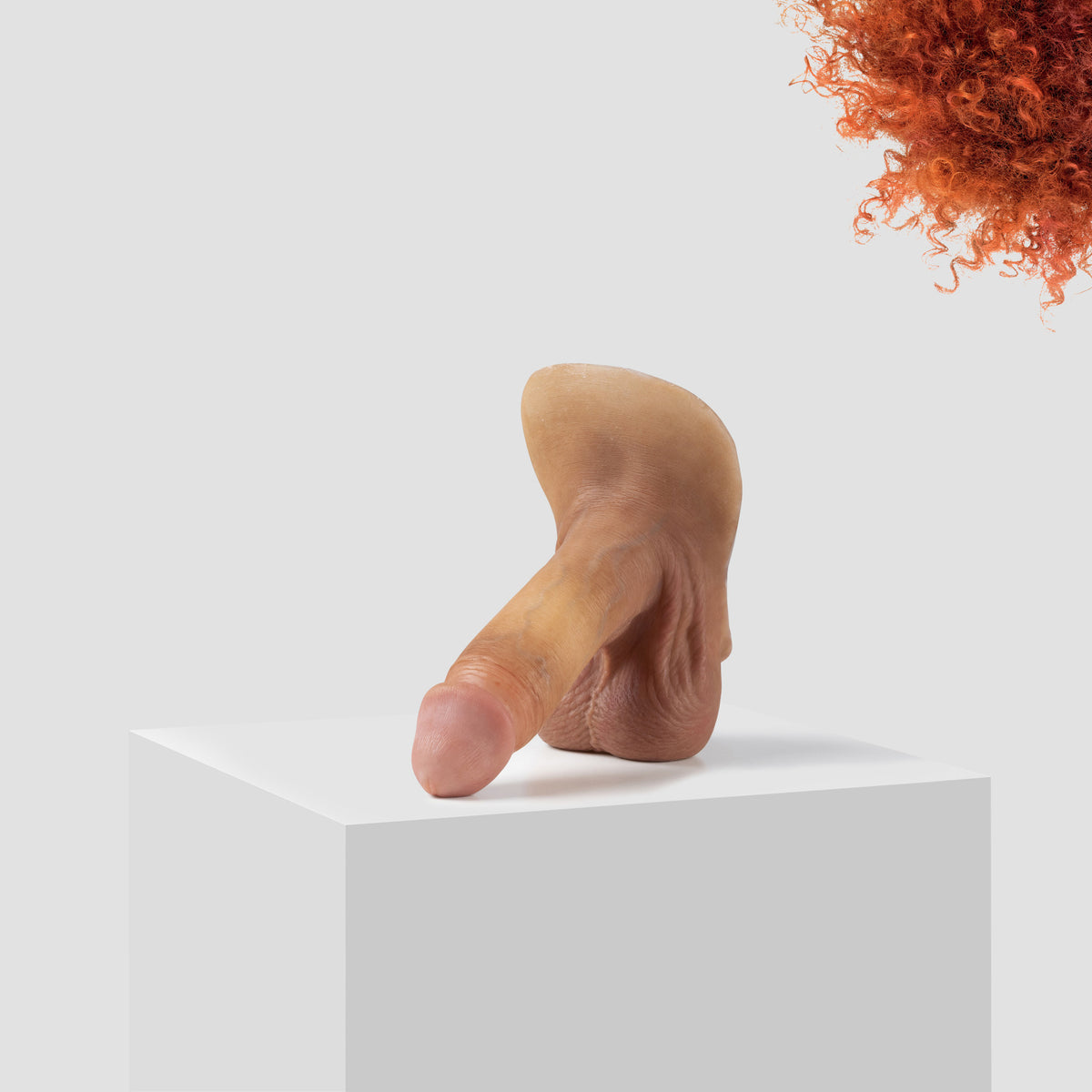 Emisil ER09 FTM pack and play prosthetic in skin shade S05 with ginger hair