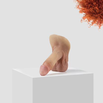 Emisil ER09 FTM pack and play prosthetic in skin shade S06 with ginger hair