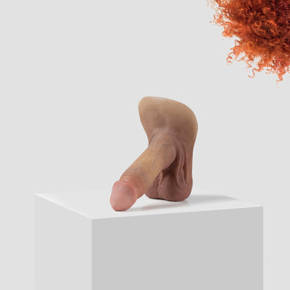Emisil ER09 FTM pack and play prosthetic in skin shade S07 with ginger hair