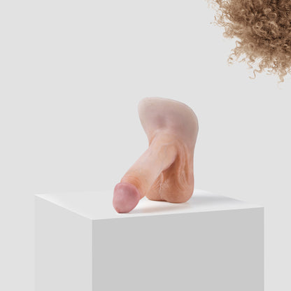 Emisil ER09 FTM pack and play prosthetic in skin shade S08 with blond hair