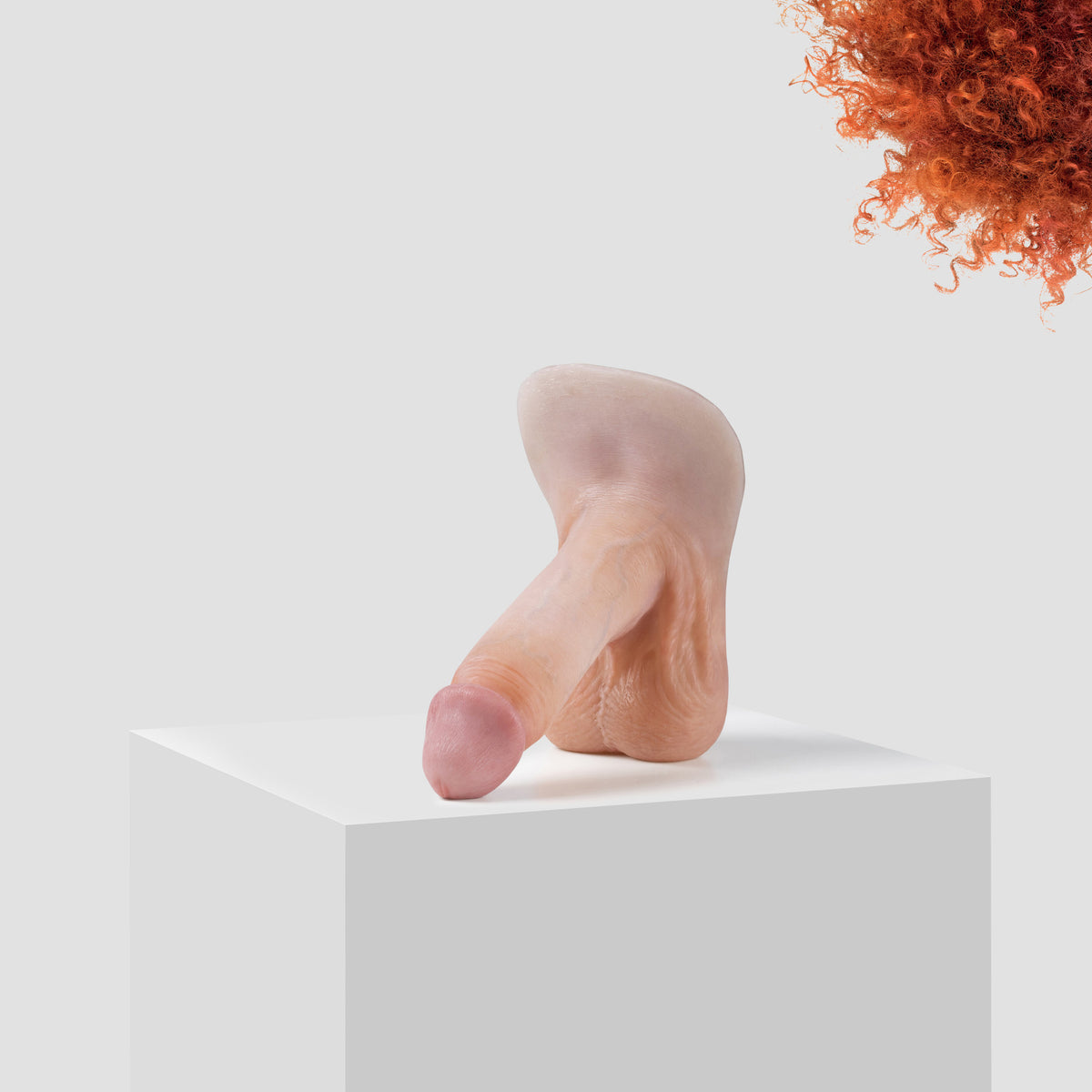 Emisil ER09 FTM pack and play prosthetic in skin shade S08 with ginger hair