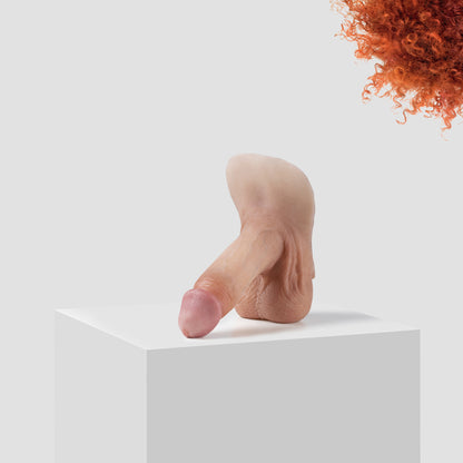 Emisil ER09 FTM pack and play prosthetic in skin shade S09 with ginger hair