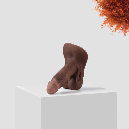 Emisil ER09 FTM pack and play prosthetic in skin shade S11 with ginger hair