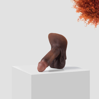 Emisil ER09 FTM pack and play prosthetic in skin shade S13 with ginger hair