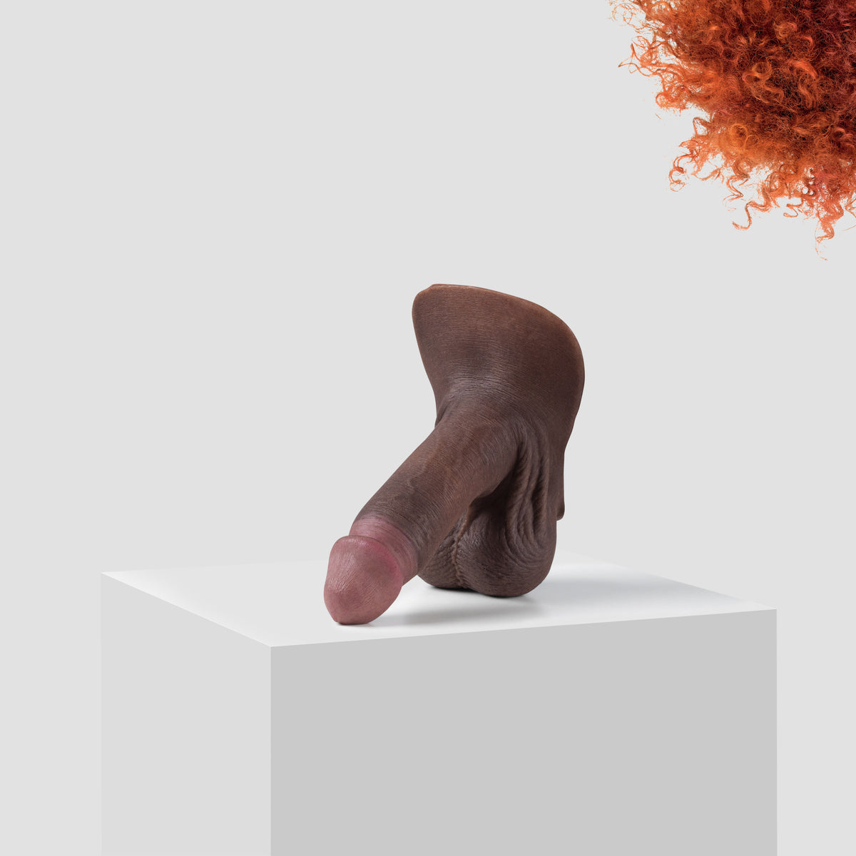 Emisil ER09 FTM pack and play prosthetic in skin shade S14 with ginger hair