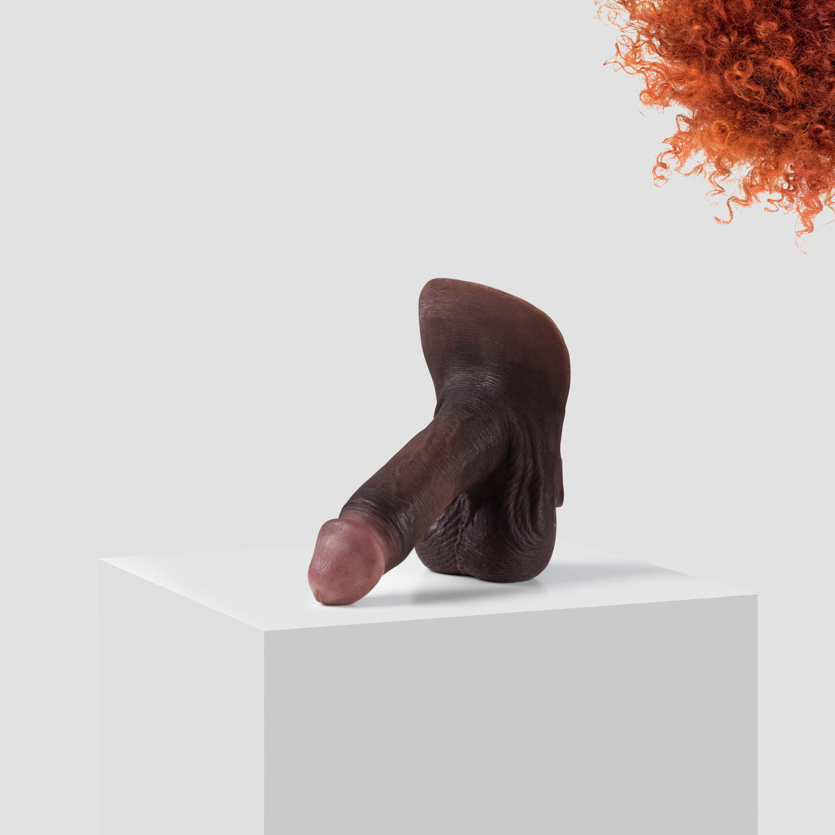 Emisil ER09 FTM pack and play prosthetic in skin shade S16 with ginger hair