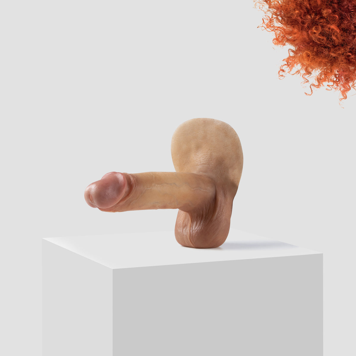 Emisil ER10 FTM pack and play prosthetic in skin shade S05 with ginger hair