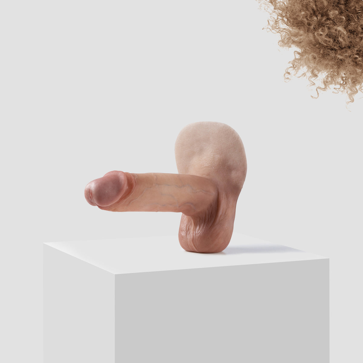 Emisil ER10 FTM pack and play prosthetic in skin shade S09 with blond hair