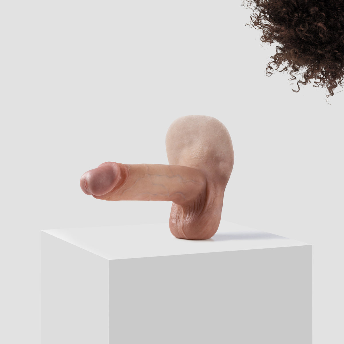 Emisil ER10 FTM pack and play prosthetic in skin shade S09 with dark brown hair