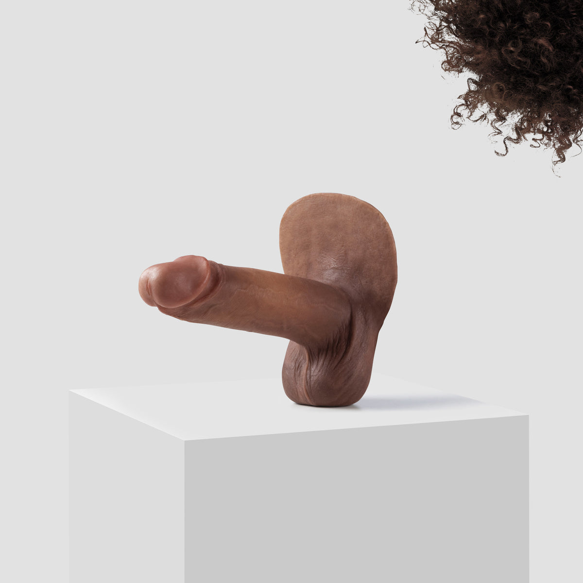 Emisil ER10 FTM pack and play prosthetic in skin shade S11 with dark brown hair