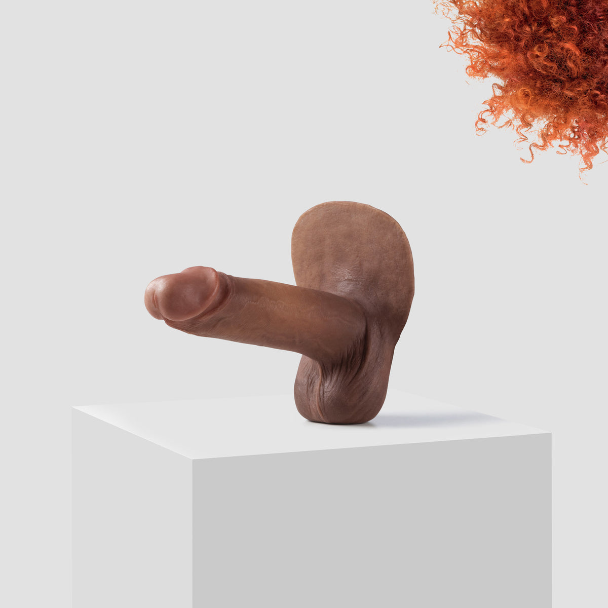Emisil ER10 FTM pack and play prosthetic in skin shade S11 with ginger hair
