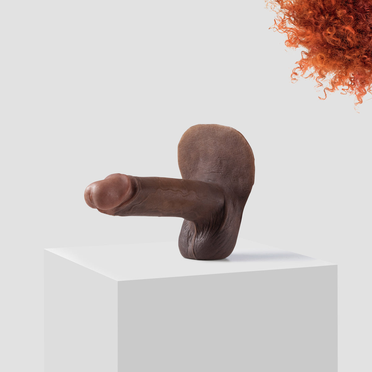 Emisil ER10 FTM pack and play prosthetic in skin shade S14 with ginger hair