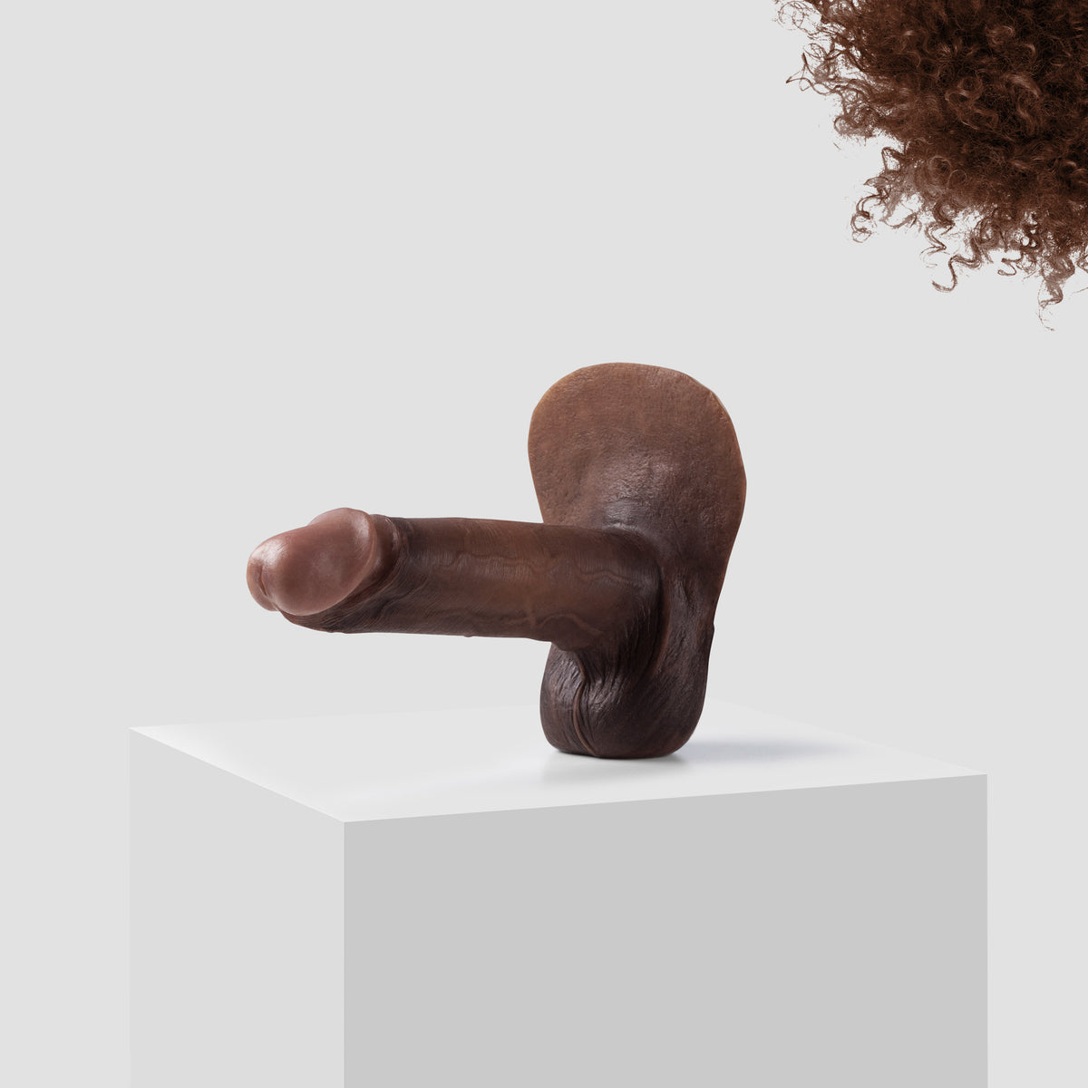 Emisil ER10 FTM pack and play prosthetic in skin shade S15 with brown hair