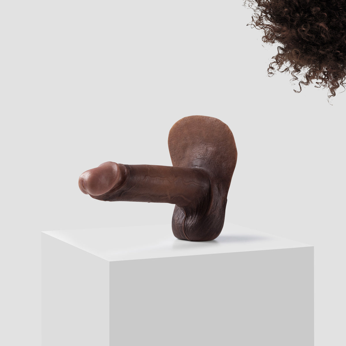 Emisil ER10 FTM pack and play prosthetic in skin shade S15 with dark brown hair