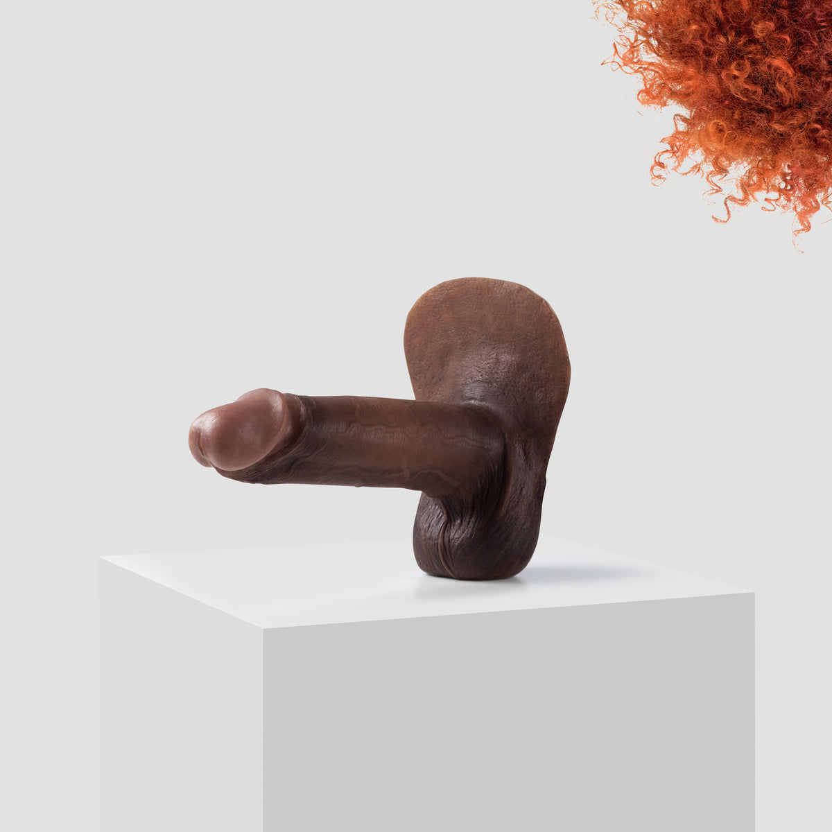 Emisil ER10 FTM pack and play prosthetic in skin shade S15 with ginger hair