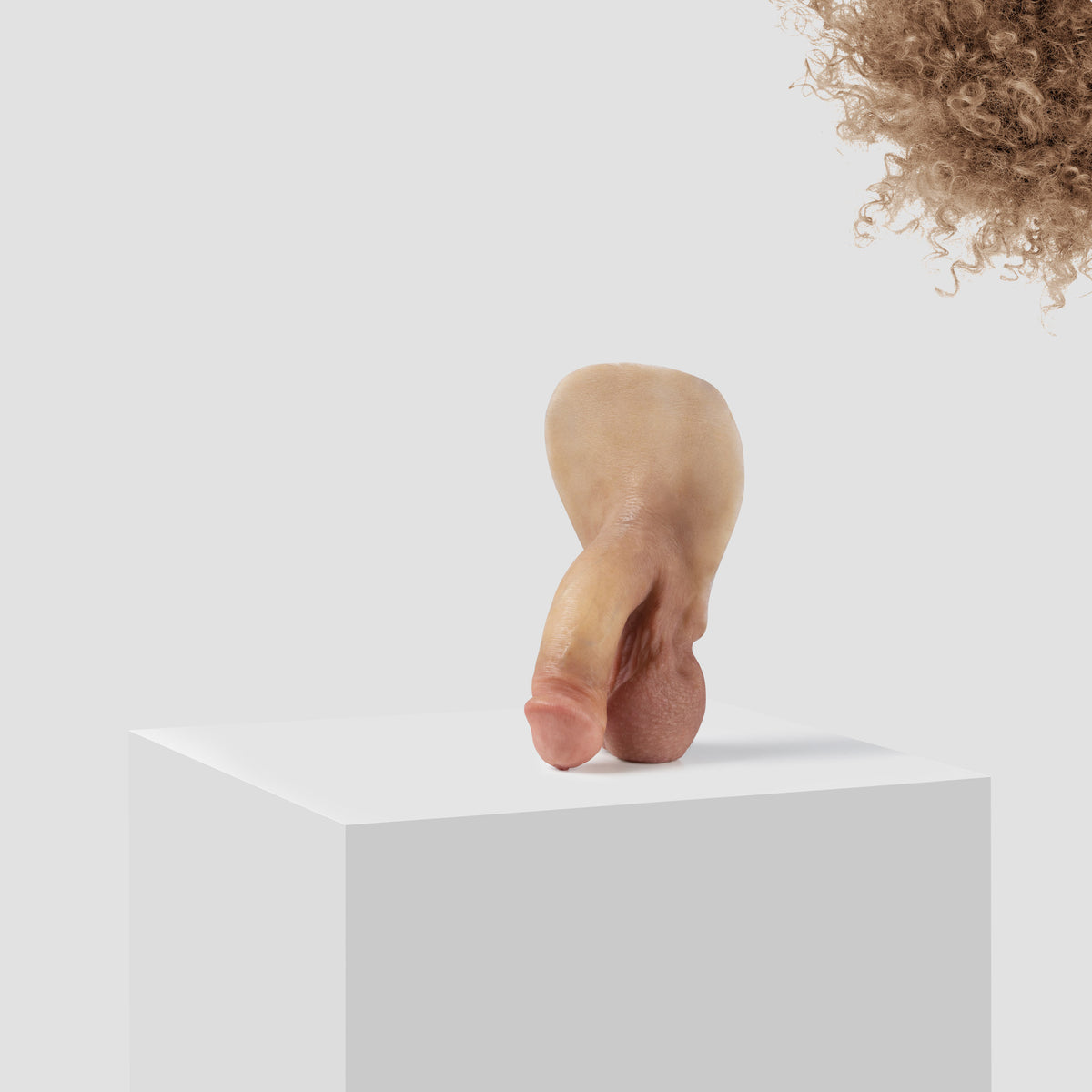 Emisil FL03 soft FTM packer in skin shade S06 with blond hair