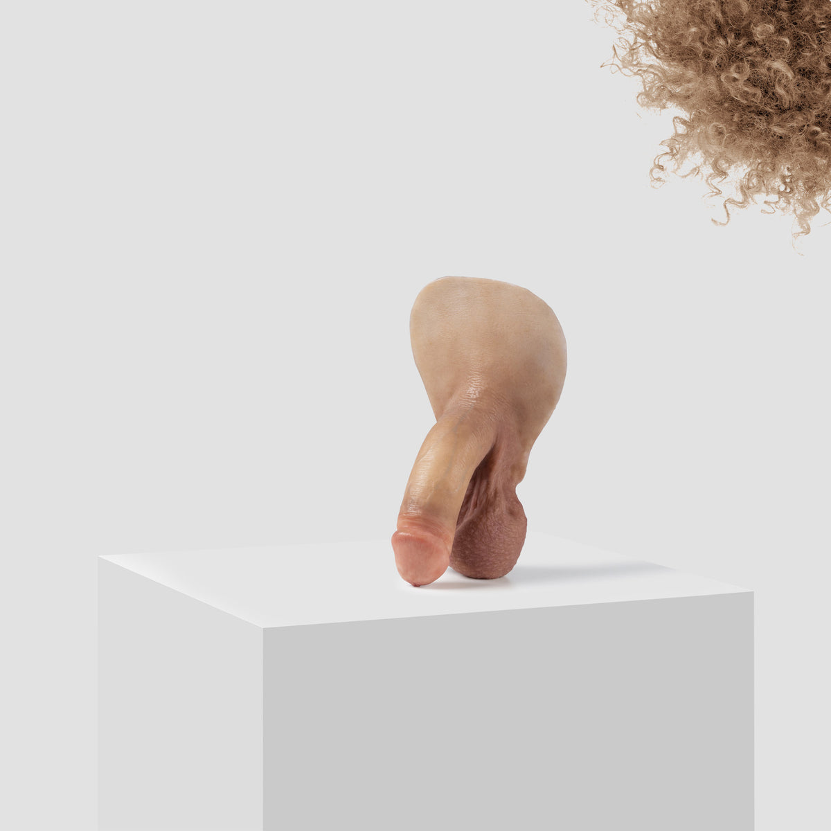 Emisil FL03 soft FTM packer in skin shade S07 with blond hair