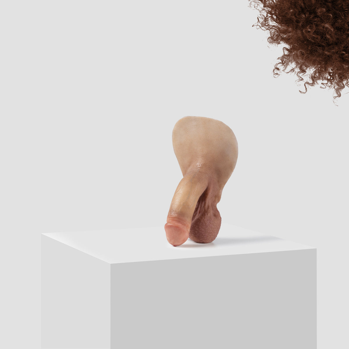 Emisil FL03 soft FTM packer in skin shade S07 with brown hair
