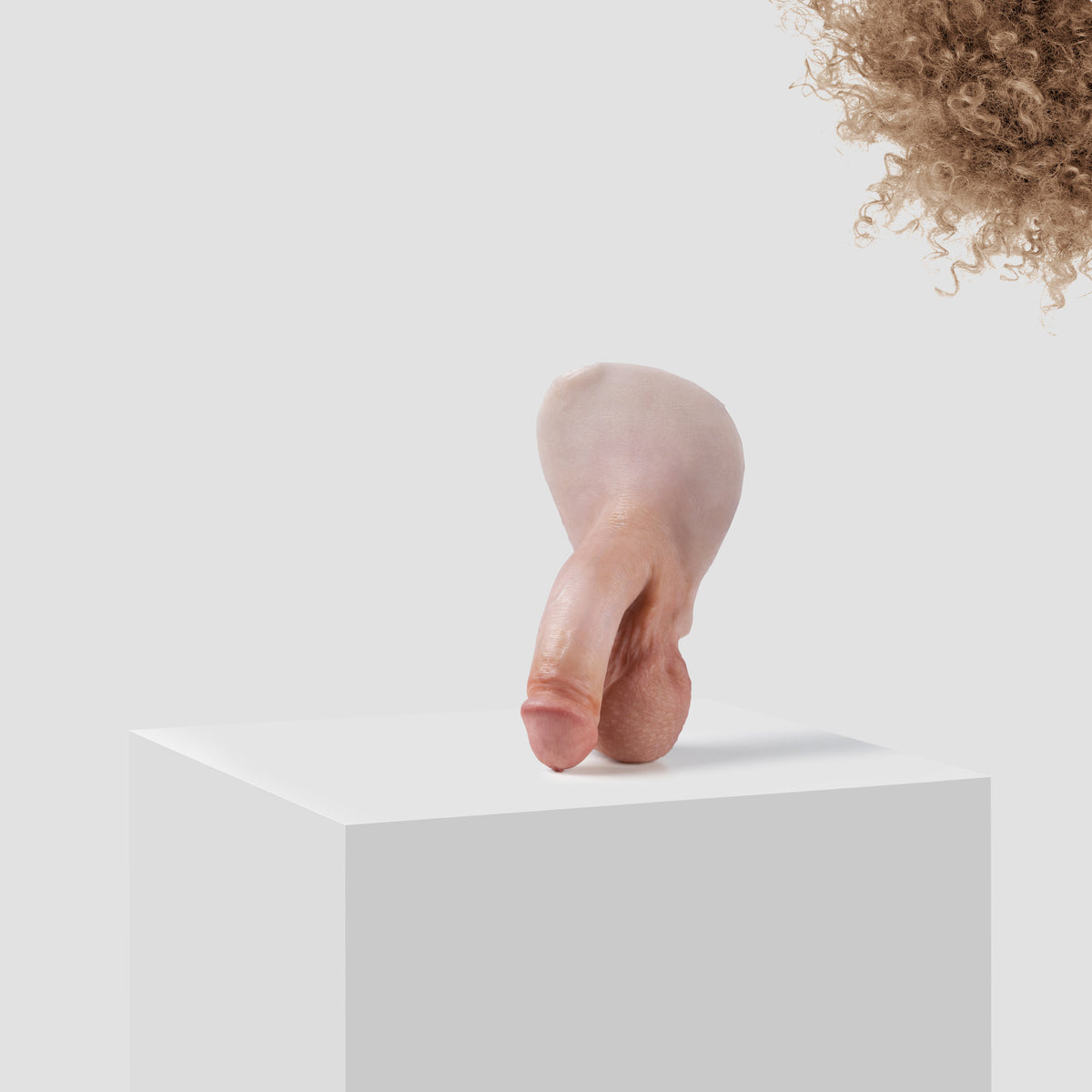Emisil FL03 soft FTM packer in skin shade S08 with blond hair