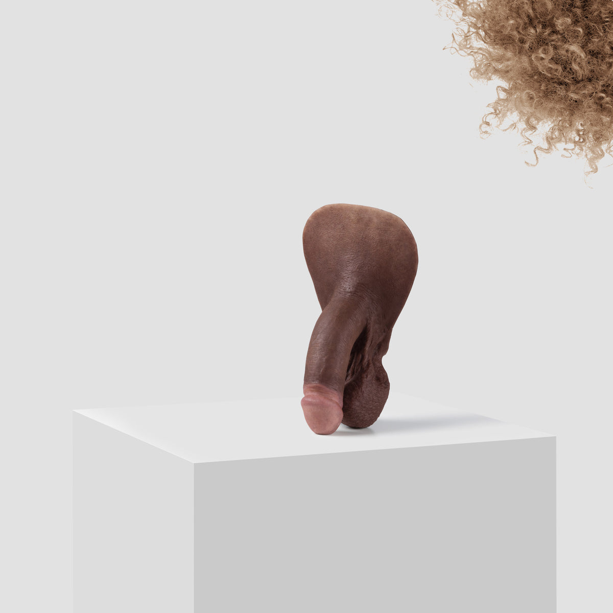 Emisil FL03 soft FTM packer in skin shade S11 with blond hair