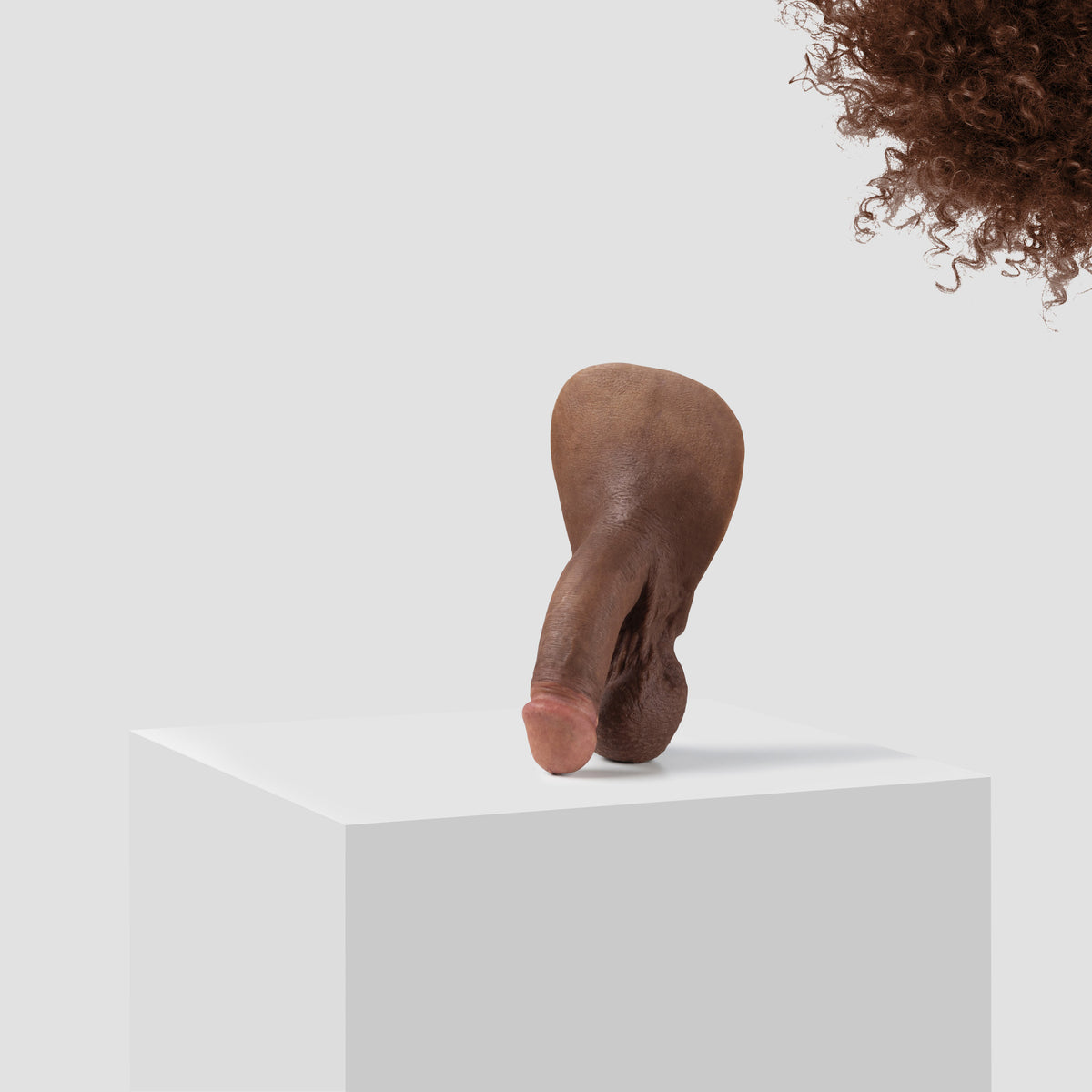 Emisil FL03 soft FTM packer in skin shade S12 with brown hair