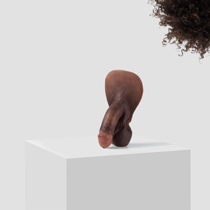 Emisil FL03 soft FTM packer in skin shade S13 with dark brown hair