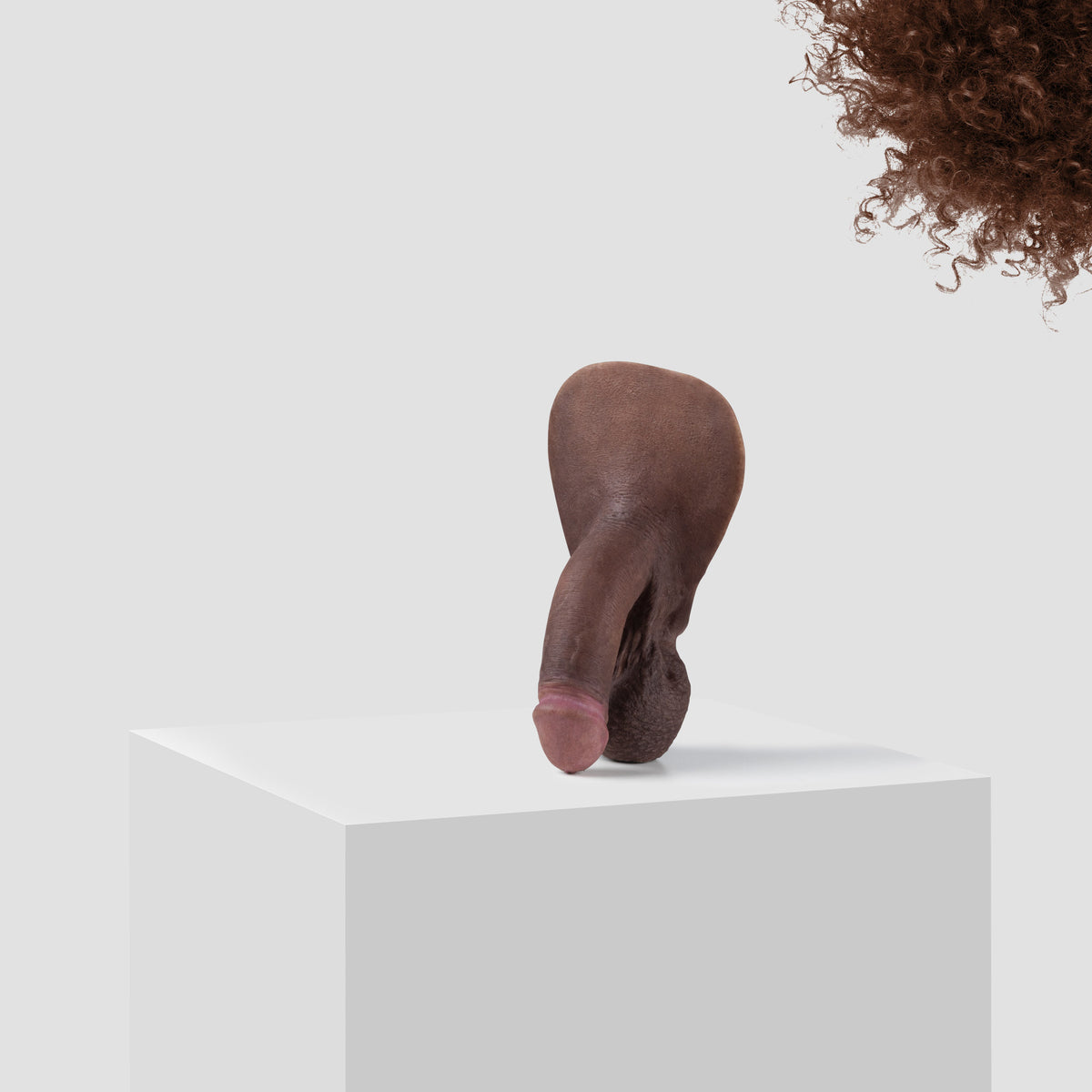 Emisil FL03 soft FTM packer in skin shade S14 with brown hair