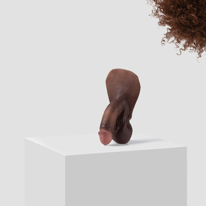 Emisil FL03 soft FTM packer in skin shade S15 with brown hair