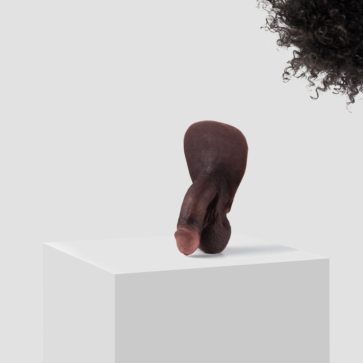 Emisil FL03 soft FTM packer in skin shade S16 with black hair