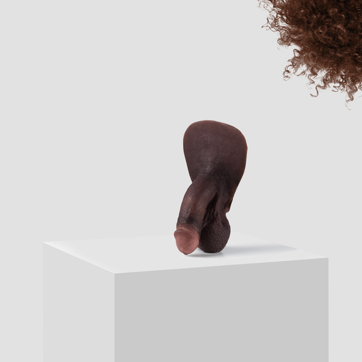 Emisil FL03 soft FTM packer in skin shade S16 with brown hair