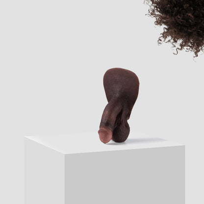 Emisil FL03 soft FTM packer in skin shade S16 with dark brown hair